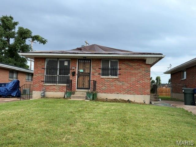 Cute brick ranch home offered by HUD with classic curb appeal, a spacious front yard, and strong potential for an owner-occupant or investor. This property offers a functional layout, full basement, and the opportunity to add personal updates, build equity, or expand a rental portfolio. The brick exterior gives the home a solid, timeless look, while the yard space adds to the overall appeal. This is a great opportunity for a buyer looking for an affordable property with room to improve and personalize. Conveniently located near neighborhood amenities, schools, public transportation, shopping, and major routes for easy access throughout the St. Louis area. Property is sold As Is.