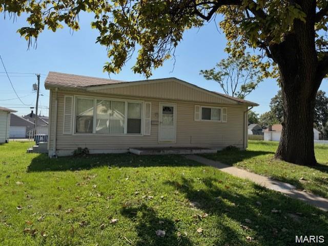 This charming and very clean 2-bedroom, 1-bath home features a generous-sized living room and convenient main-floor laundry. The location offers easy highway access, making daily travel simple and stress-free.  The property currently has a month-to-month tenant who would love to stay, making this a fantastic investment opportunity for anyone seeking immediate rental income with a well-kept home.  Please give 24 hour notice for a showing.