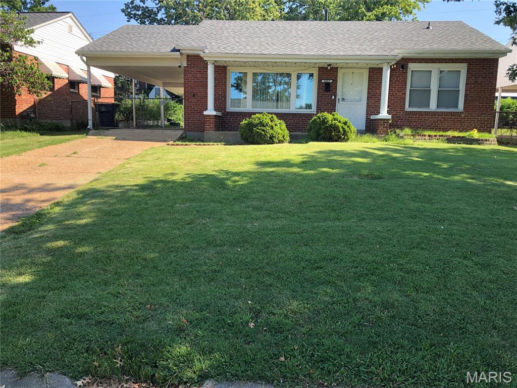 Welcome home to this fabulous 3 bedroom 1 bath house in the wonderful BOULEVARD HEIGHTS neighborhood. There is a separate kitchen and dining/living room area. Down the hall is a newer bathroom and 3 bedrooms with all wood floors. Down in the lower level there is a huge family room for entertaining, a separate room ( to do with as you please ) and plenty of storage. Outside there is a long covered carport/patio, fenced in backyard and a large storage shed. A/C/ FURNACE is newer and roof is 1 year old. The house is located near restaurants, fun and CARONDELET PARK. This one has it all. This house could be yours. Already passed OCCUPANCY.