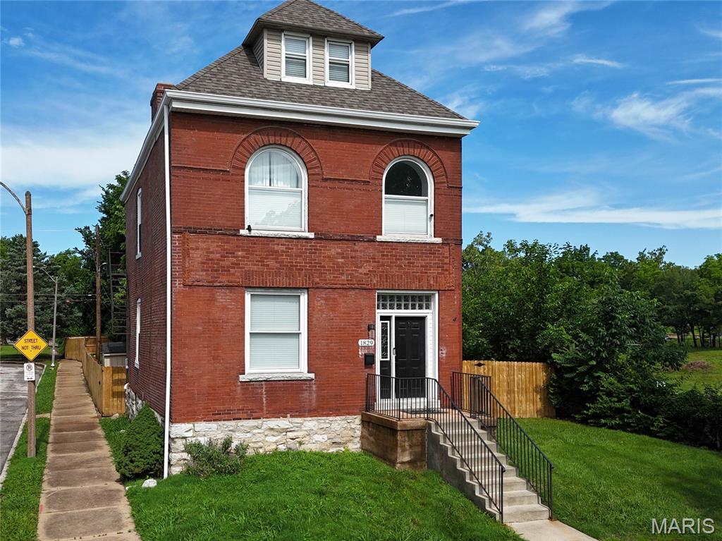 *** Motivated Sellers***** Welcome to 1829 Oregon Avenue. a beautiful updated three-story brick home nested on a quiet cul-de-sac in the heart of Fox Park. Offering over 2,600 square feet of living space. this spacious resident seamlessly blends historic character with modern updates. Step inside to find an open and inviting main level featuring expansive living and dining space, updated flooring and stylish kitchen complete with granite countertops. stainless-steel appliances, abundant cabinetry, a sunny breakfast area overlooking the back yard.  A convenient half bath completed the main floor.  

Second level features a versatile office or flex space and an impressing primary suite with a custom walk in closet and luxurious spa- inspired bathroom.  Third floor provided two additional generously sized bedrooms and full bath, offering plenty of room for family, guest, or work from home needs. Located just minutes from SLU, Lafayette Park & Tower grove, major highways, dining and entertainment, this home delivers the perfect combination of space, styles, and location and additional fenced lot that could easily accommodate a garage -but you might just want to enjoy your green space!