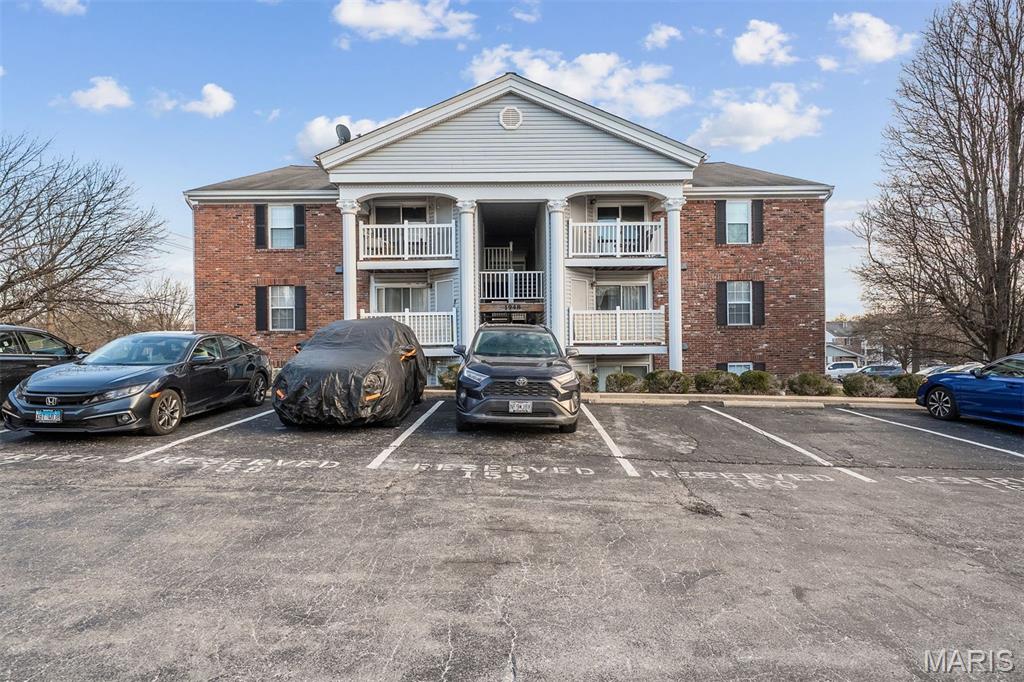 Beautifully updated and well maintained condo in a prime location! This bright and open two bedroom condo is the perfect set up for first time homebuyers, downsizers and everything in between. Newer hardwood floors flow throughout the open concept living space. The kitchen features white cabinets, stainless steel appliances, new lighting & tons of storage. The primary bedroom has multiple closets and an updated en-suite bath with a large walk in shower. A second bedroom with a huge closet and a second updated full bathroom with tub & shower complete the space. Spend an evening on your covered patio complete with additional storage space and direct access to the nearby common areas. In unit laundry, a covered carport space, a rarity in the complex, and a neighborhood pool provide the all the conveniences you want in this move in ready condo!