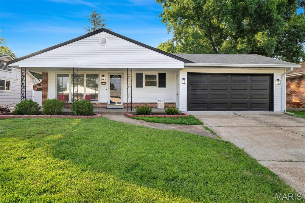 Spectacular opportunity to own this lovely 3 bedroom, 2 bath ranch home with 2 car garage !  Open and bright living room with hardwood floors, eat in kitchen with wood cabinets and black appliances which opens into the huge family room with fireplace ! The family room is the perfect place to gather with family and friends . Three nice sized bedrooms , the primary bedroom suite is accessible from the hall or from the family room. The lower level offers even more living space , a great area for an additional tv area, game room, or play room.  level fenced backyard , great for play or relaxing . This home has so much to offer, it is a must see ! Showings will begin Thursday, be sure to make your appointment , you won't want to miss this one !