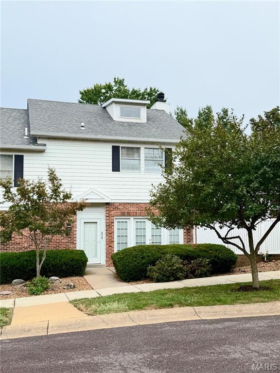 Welcome to this well-maintained condo in Washington, MO, featuring a unique and functional floor plan with plenty of space to make your own!
The main level offers a spacious living room with vaulted ceilings and an electric fireplace, creating a warm and inviting atmosphere. The kitchen features stainless steel appliances, abundant cabinet storage, and a convenient eat-in area. French doors from the dining area lead to the deck, providing an easy transition to outdoor entertaining or relaxing.

Upstairs, you'll find two bedrooms, each with its own private bathroom. The primary suite features a unique loft area that can be used as a cozy reading nook, home office, or additional living space. The primary bathroom includes a tiled walk-in shower and single-bowl vanity.

Convenience continues with two laundry hookup options. The second bedroom includes a private bath with space for a stackable washer and dryer, while an additional washer/dryer hookup is available in the lower level.

Downstairs, the finished lower level offers an additional family room—perfect for entertaining, movie nights, or simply spreading out and enjoying more living space.

With its versatile layout, thoughtful features, and inviting spaces, this condo is ready to welcome you home. Schedule your private showing today and get ready to call this one "Home Sweet Home!"
