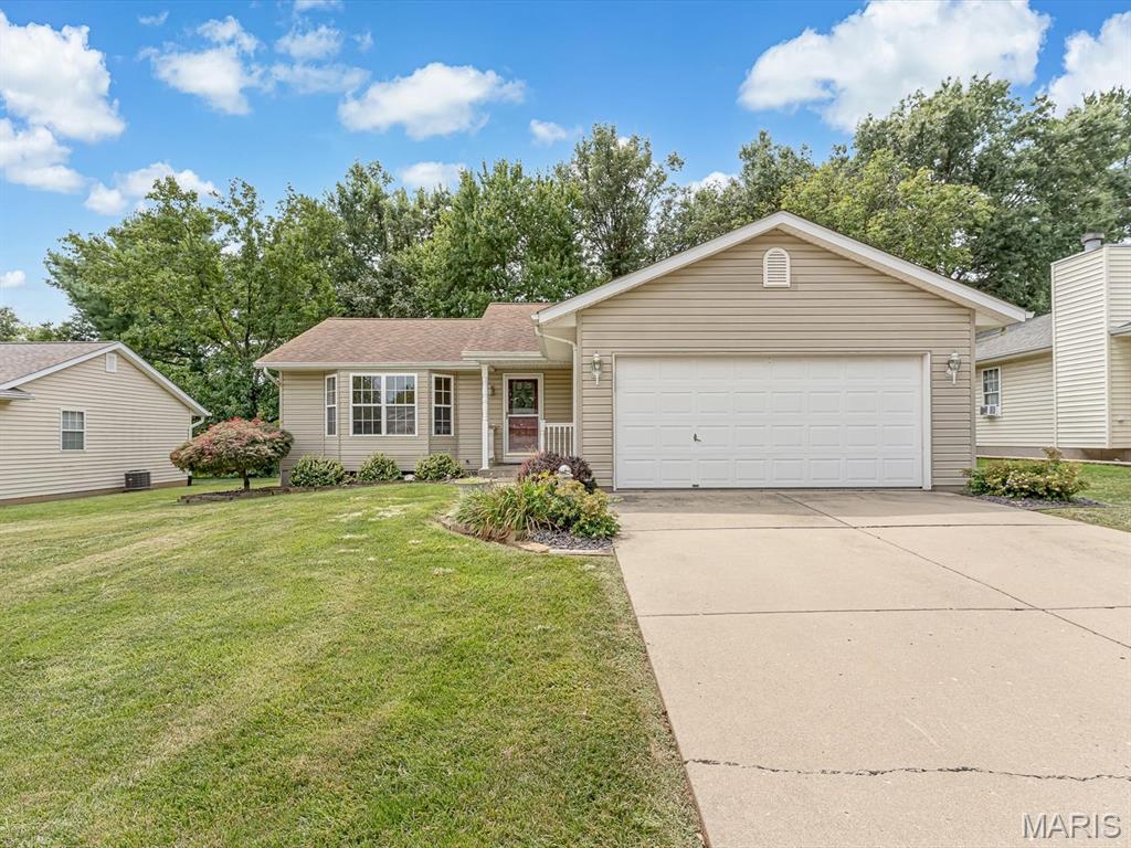 Welcome to this spacious 2-bedroom, 2.5-bath ranch in Sandalwood Courts! The main level features a bright living room with a bay window, an eat-in kitchen with abundant cabinetry, a primary suite with a private half bath and walk-in closet, a second bedroom, full bathroom and convenient main-floor laundry. A window-filled sunroom opens to the patio and backyard. The finished basement expands the living space with a large recreation area, full bathroom and nonconforming bonus room ideal for an office, hobby room or overnight guests. An attached two-car garage, freshly updated landscaping, mature trees and a backyard storage shed complete this versatile home.