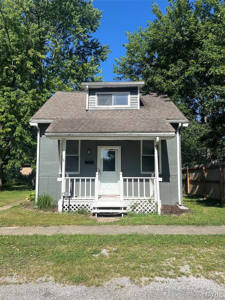 Welcome home to this charming two-bedroom bungalow that's perfect for first-time homebuyers or anyone looking to downsize. Conveniently located close to town, this home offers a blend of character, comfort, and recent updates. Inside, you'll find a partially remodeled interior featuring a spacious living room, a dedicated dining room, and a versatile bonus space that can easily serve as a home office, mudroom, craft room, or play area. The main floor includes a comfortable bedroom and a full bathroom, providing convenient one-level living, while the second bedroom is tucked away upstairs for added privacy. Step outside to enjoy the inviting front porch, perfect for relaxing with your morning coffee, and a nice-sized backyard with plenty of room for gardening, entertaining, or simply enjoying the outdoors. Whether you're looking for your first home or a cozy place with flexible living space, this bungalow is full of potential and ready for its next owner. Call your favorite realtor today for a showing! This could be yours by fall!!!
