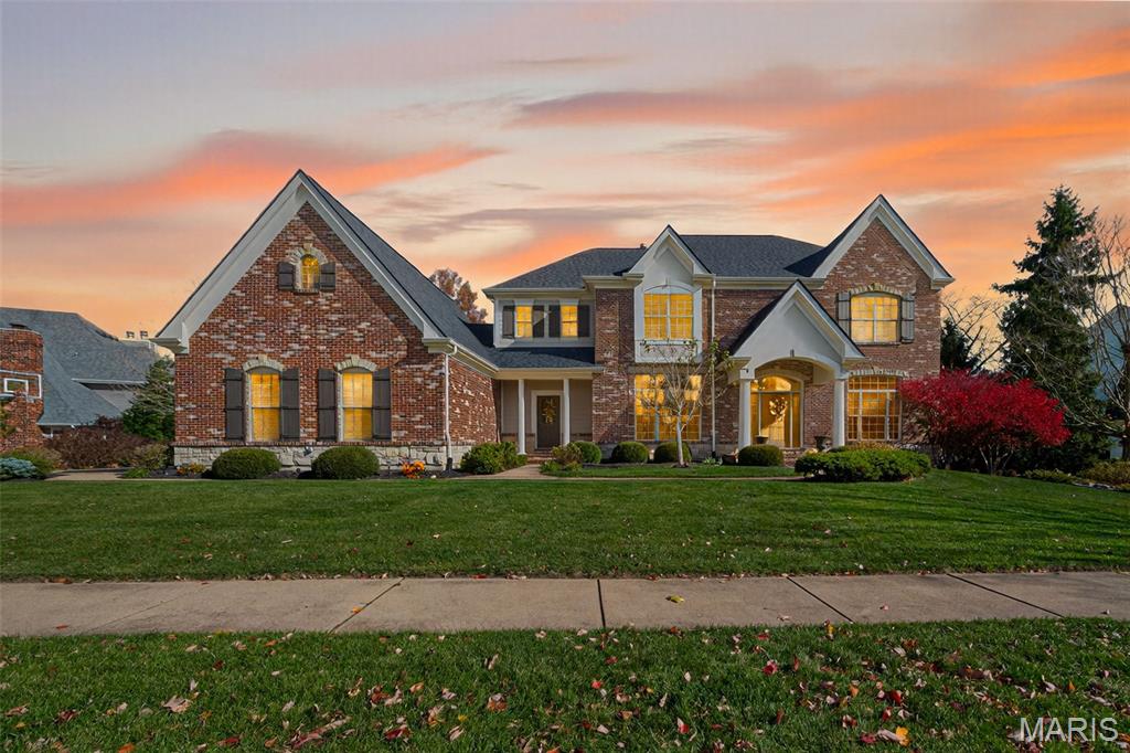 Stunning 2 story home in sought after Country Lake Estates features 5 bedrooms, 6 bathrooms (4/2), 3 car garage, & over 6,400 sq. ft. of finished space in this updated home with many modern luxuries. Custom Hardwood floors and crown molding accents span most of the main floor.  Main floor boasts: light filled entry way, Den/Executive office with French doors & custom built-ins, a formal dining room that leads to built-in buffet with additional storage, Great room with gas fireplace and wet bar with custom stone accent wall. Exquisite, Gourmet kitchen offers large island ideal for entertaining and quartz counters, gas cooktop with vented hood, double wall ovens with warming drawer, Jenn-Air stainless steel appliances, and walk-in pantry in the breakfast room. Hearth room with brick & stone surround, wood burning fireplace and vaulted ceilings has convenient access to the backyard oasis with patio space and outdoor fireplace sitting area. Main floor laundry, 2 powder rooms, mudroom with cubby space for the whole family complete the main floor.  Upstairs find the spacious Primary bedroom en-suite with newly updated luxury, spa-like bath featuring a soaking tub and separate custom tiled shower with seat and additionally offers dual vanities and dual closet spaces with personalized shelving & drawer storage. Three additional bedrooms complete the second level with recently updated baths that offer sleek finishes: one is an en-suite and the 3rd & 4th bedrooms share a Jack & Jill bath. Expansive lower-level rec room is suitable for all ages and features fitness room, 5th bedroom/office, full bathroom, and bar area in the entertainment space. Other updates include: Electrical ’25, Roof ’23, HVAC ’21 and so much more!