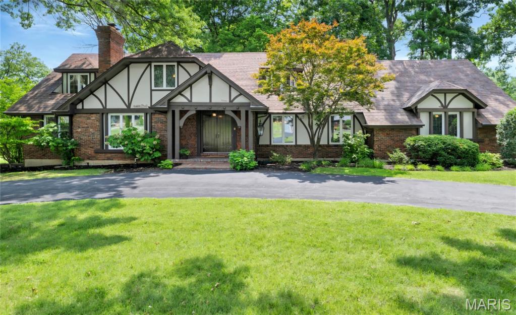 A unique 4 bedroom Meadowbrook Country Club Area Brick and Stucco Home. Competitive pricing making this exceptional Golf Course Property one of the Best Values on the Market! A well maintained home on the fairway! This home sits on almost an acre lot with beautiful mature trees and large brick patio. The backyard is truly a showpiece! The residence blends classic architectural design with bright expansive Interiors suited for both everyday living and sophisticated entertaining!!! This home is a must see!