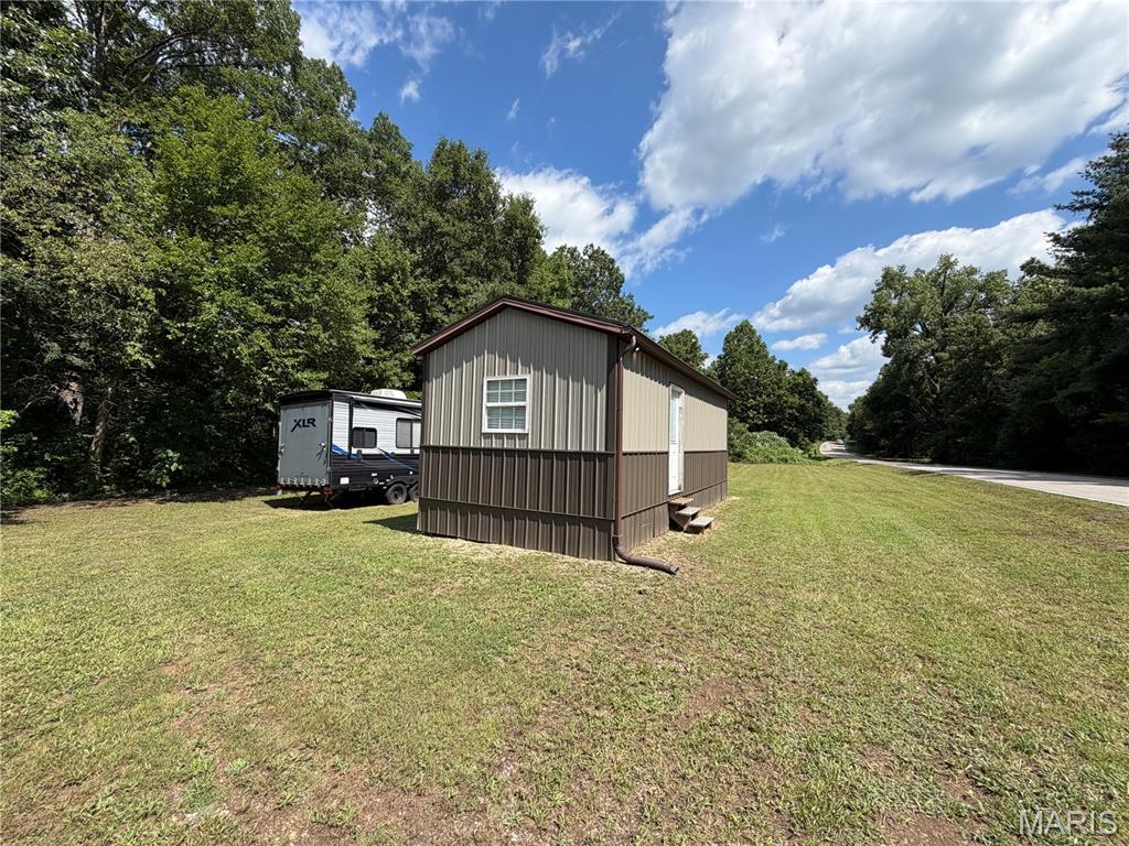 Need a weekend getaway Cabin?? A TINY HOUSE? Vacation rental property? Well, this two room cabin could be it!!! Located close to Clearwater Lake and the Black River. Acquire a place to get away and enjoy the country.
