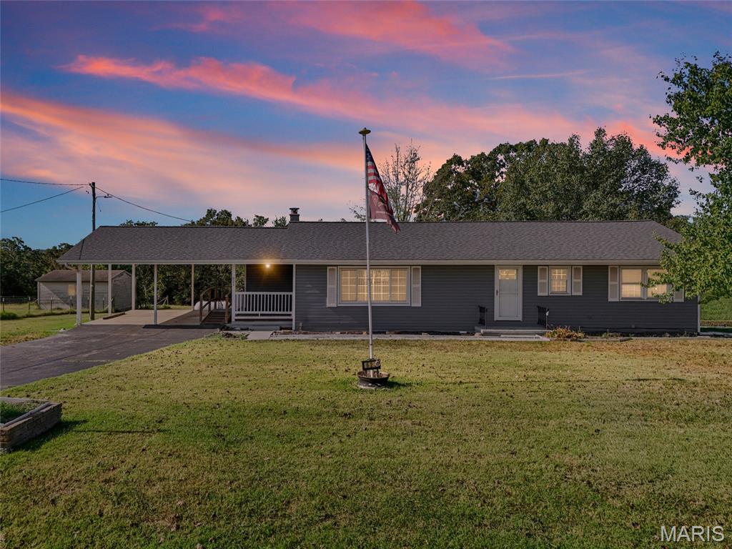 Welcome home to this beautiful 3 bedroom 2 bathroom ranch nestled on 1/2+/-  acre lot located right outside of town.  Home was rehabbed in 2018 prior to owner purchasing property.  This open floor plan features a beautiful kitchen with solid surface countertops that opens up to the large living room/dining room combo. Primary bedroom features a nice size bathroom with walk in shower.  There is plenty of areas to enjoy the nice gently sloping yard with a covered deck as well as a large patio out back for entertaining.  This home also features a shed perfect for storing your yard equipment and basement/cellar for additional storage.  The propane tank and water softener is owned, however, the propane tank gas and monitor system is not included in the sale.  The seller currently pays for the dust to dawn light at the property as part of their budget billing electric bill. Sale to be AS-IS.  Any inspections will be for buyers knowledge.  Schedule your appt. today.