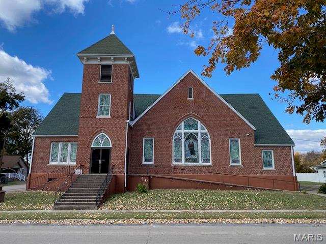 Beautiful church and rectory in the heart of Oran, Missouri!
Offered together, these well-maintained properties present a rare opportunity full of potential. The owner is open to selling the properties separately for the right price.

This well-preserved historic church, complete with a traditional church bell, features stunning woodwork, breathtaking stained glass, and updated electrical systems with renovations completed in 2007. The church offers approximately 7,000 sq. ft. of space, including a full lower level with bathrooms and a complete kitchen — ideal for gatherings or events.

The rectory is a charming brick home of approximately 1,530 sq. ft., featuring three bedrooms, two full baths, a kitchen, living room, dining room, and laundry room. It also includes updated electrical and HVAC systems for modern comfort and efficiency.

Set on a spacious lot with mature trees, this property combines small-town tranquility with timeless character — perfect for a new or relocating church, multi-use facility, event space, or community center.

Prime location. Classic charm. Endless possibilities in Oran, Missouri!