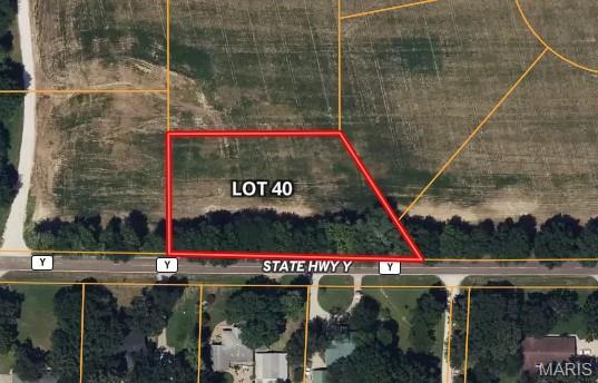 Beautiful and spacious 1+ acre lots available in the desirable McMorland Acres community, located in St. Paul, MO. These prime parcels are perfect for custom-built homes and offer the flexibility to bring your own builder to create your dream home. Enjoy the convenience of public utilities, including water and sewer services, making for an easy and efficient building process. The lots are located in a peaceful, yet easily accessible area, just moments from Hwy 70, providing quick access to surrounding areas, shopping, dining, and more. Whether you’re looking for a quiet retreat or a place to build a family home, McMorland Acres offers a fantastic setting to suit your needs. Additional Rooms: In Platted Subdv.
