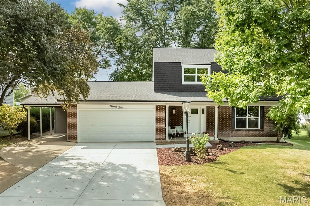 This home is a show stopper, a must see inside! Fresh, stylish and beautifully renovated 4-bedroom, 2.5-bath St. Peters two-story. Step inside to a bright, neutral interior with new engineered wood flooring, baseboards, doors and fresh paint throughout. The updated kitchen steals the show with new cabinetry, sleek hardware, subway tile backsplash, new sink and stainless appliances, while multiple dining and living spaces provide plenty of room to spread out and entertain. Just beyond the kitchen, the inviting family room features a shiplap-accented fireplace, while the light-filled sunroom adds another special gathering space with a beautiful wood-plank ceiling and backyard views. Convenient main floor laundry.

Upstairs, you'll find four bedrooms, including a primary suite with private full bath with beautiful tiled shower and black shower door.  The updated full hall bath also has beautiful tiled shower. Ceiling fans in 3 of the bedrooms. Unfinished basement offers additional space that could be finished. Major improvements go well beyond the cosmetic and include a new roof, windows, exterior doors, gutters and driveway. Outside, the spacious, tree-lined backyard offers mature landscaping, patio spaces and plenty of room to relax, play or entertain. Yard is fully fenced and already has a firepit area ready for fall fires and smores! Attached two car garage as well as additional parking with the one car carport. Plenty of storage outside with attached storage shed behind the carport and a detached shed in the backyard. Conveniently located in the heart of St. Peters near shopping, dining, parks and recreation. Spencer Creek Park just around the corner!