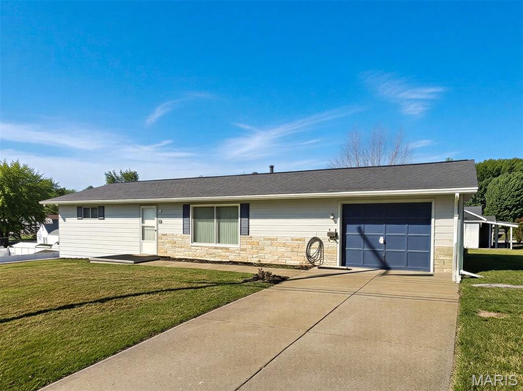 This ranch home on an oversized corner lot is conveniently located in the heart of Festus! The main level offers two bedrooms, one full bath, and an open living and dining area, all with hardwood floors. Off the dining room, step outside to a covered back patio overlooking the spacious yard. The Partially finished lower level offer additional space with a second full bathroom, a full kitchen, two bonus room with closets, and additional unfinished space storage. Recent updates include a brand new roof and brand new HVAC both installed August 2026. Great in-town location with plenty of space and possibilities on both levels!