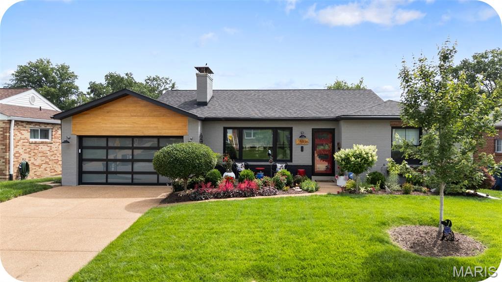 Welcome to the quintessential St. Louis Hills ranch—where city living meets the kind of neighborhood charm that's getting harder and harder to find. Imagine evening walks to Francis Park for a sunset stroll or outdoor yoga, meeting friends for happy hour on the patio at Rockwell Beer Garden and living in a close-knit community where neighbors still lend a hand when you're one egg short of finishing a loaf of banana bread.

The current owner purchased the home in 2017 after it had already been renovated & planning to stay for the long haul, took it even further. The result? A thoughtfully expanded floor plan featuring a luxurious primary suite addition and a screened porch that will probably become your favorite room in the house.

From the moment you arrive, it's clear how much care and attention have been poured into this home. The inviting living room, complete with a fireplace, flows seamlessly into the dining area and beautifully updated kitchen. A cheerful window above the sink frames views of the lush backyard, making everyday tasks feel a little more enjoyable.

The screened porch is truly something special. Curl up with your morning coffee and a good book, enjoy the warmth of the fireplace, and listen to the birds chirp while the world slows down around you. It's the kind of space that instantly helps you exhale.

Down the hall, you'll find two comfortable bedrooms and an updated full bath before arriving at the private primary suite retreat. Designed for relaxation, it features a spacious walk-in closet, double vanities, a separate shower, and a soaking tub that feels more spa than bathroom.

Need even more space? The finished lower level delivers with a large rec room anchored by a vintage fireplace, a potential fourth sleeping area or home office, laundry, and a third full bath.

Outside, the backyard is larger than many in the neighborhood, offering endless possibilities—whether that's gardening, tossing a ball for the dog, setting up a playset, or hosting summer gatherings with friends and family.

Meticulously maintained and beautifully updated, this is the kind of home buyers wait for in St. Louis Hills: timeless, welcoming, and ready to make its next owners happy for years to come.