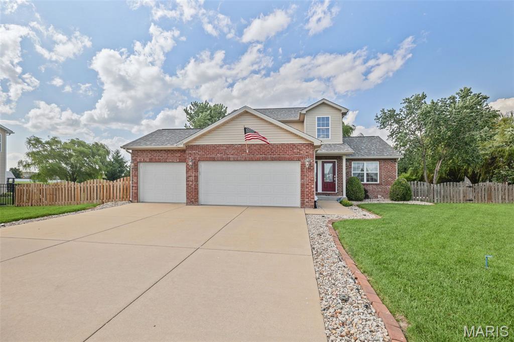 Welcome home to 1163 Larkspur Drive! Fantastic location, plenty of room to relax and entertain, and a spacious floor plan make this home a must-see! Nestled on a quiet cul-de-sac in the highly sought-after Mascoutah School District, this beautiful home offers the perfect blend of comfort, functionality, and entertaining space.
Recent updates include brand-new carpet (2026), a new roof (2025), large shed (2024) with a concrete foundation (2024) and two concrete patios (2024) making this home truly move-in ready.
The main level features a spacious primary suite complete with a large walk-in closet and private en-suite bath. The heart of the home is the open-concept living area, where the living room, dining area, and kitchen flow seamlessly together—perfect for everyday living and entertaining family and friends. The beautiful fireplace creates a warm and inviting focal point in the living room, adding both charm and comfort to the space. Convenient main-floor laundry is located just off the oversized three-car garage.
Upstairs, you'll find three additional bedrooms and a full bathroom, providing plenty of space for family members or guests. The finished lower level offers even more living space with a large family room featuring a wet bar, creating the perfect setting for game days, gatherings, or movie nights. An additional room provides flexibility as a fifth bedroom, home office, fitness room, or hobby space. A full bathroom and abundant storage complete the lower level.
Step outside and enjoy your own backyard retreat! The fenced yard features a wraparound deck with a covered pavilion and plenty of room to relax, entertain, or play. Conveniently located near Scheve Park, Scott AFB, shopping, dining, and schools, this home also offers a one-of-a-kind experience—incredibly close front-row seats to Mascoutah's spectacular Fourth of July fireworks display right from your own driveway!
Don't miss your opportunity to own this exceptional home. Schedule your private showing today!