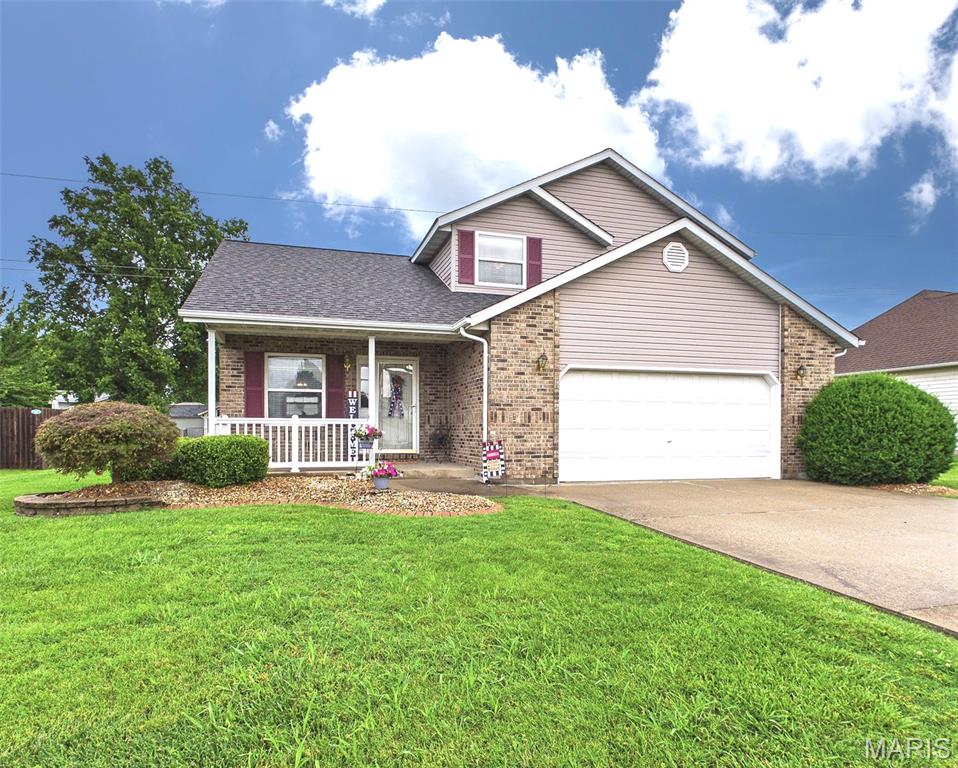 Welcome to this charming two-story home in the desirable Graceland Estates subdivision! Featuring 3 bedrooms, 2 full baths, and a convenient half bath on the main level. This home offers plenty of space for comfortable living. The main floor boasts a spacious kitchen with abundant cabinetry, a formal dining room, a welcoming living room, and an additional family room perfect for relaxing or entertaining- all on the main level! Upstairs, the primary suite includes a private full bath, plus two secondary bedrooms and full bathroom. Unfinished lower level offers plenty of storage space and endless possibilities. Updates include Roof (2017), Furnace & A/C (2012), Siding (2017), Hot Water Heater (2026). Great level lot with nice size patio. Complete with a 2-car attached garage, this home combines functionality, space, and a great location!