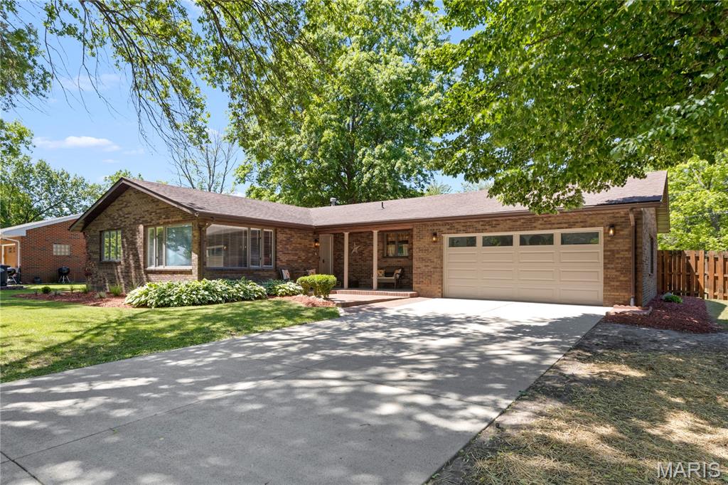 Nearly 2,700 Finished Sq. Ft. | 4 Bedrooms | Edwardsville School District

Space, warmth, major updates and true move-in-ready confidence — this all-brick home delivers the complete package.

Located in the highly desirable Edwardsville School District, this beautifully maintained 4-bedroom, 2-full-bath home offers nearly 2,700 square feet of finished living space, an expansive finished lower level, an exceptional primary suite and a long list of improvements already completed for its next owner.

Inside, natural light fills the spacious main living area through a wall of windows. The kitchen features abundant cabinetry, generous counter space, stainless-steel appliances and a center island, flowing into comfortable dining and gathering spaces with direct access to the deck and backyard.

One of the home’s standout features is the very large primary bedroom with an attached private office and walk-through closet — a rare setup offering space for working from home, a sitting area or a private retreat without sacrificing another bedroom.

The finished lower level adds tremendous usable living space, with room for a second family room, home theater, game room, gym, play area or entertaining space. Three additional bedrooms and two full bathrooms give the home the flexibility families need as life changes.

Outside, the all-brick exterior is surrounded by fresh landscaping, mature trees, a spacious yard, new deck and attractive exterior lighting. Parking is exceptional, with an attached garage, 6-car driveway and 3 additional front parking spaces.

Extensively Updated & Meticulously Maintained

Major improvements include a new roof installed by Beasley Roofing with warranty, new Clopay garage door with large windows, quiet belt-driven garage door opener, new Andersen sliding glass door, new deck, all-new landscaping, all-new electrical and new lighting fixtures throughout.

The care goes beyond what you can see. The A/C has been cleaned and serviced, water heater maintained and sediment drained, and sump system maintained and sealed. The home also features a radon mitigation system, wiring for Vivint home security and infrastructure for TWO Level 2 EV chargers.

Stainless-steel kitchen appliances include a newer dishwasher and microwave, with the stove and refrigerator included.

All-brick construction. Nearly 2,700 finished square feet. Four bedrooms. Two full bathrooms. Edwardsville schools. An oversized primary suite with private office and walk-through closet. Expansive finished lower level. Major recent improvements. Exceptional parking. Mature outdoor space. Dual-EV readiness.

This isn’t simply a home with impressive square footage — it’s a home that has been cared for, invested in and prepared for what comes next.

Some homes give you a list of projects after closing. This one gives you the keys.

Schedule your showing and come see why this one deserves to be at the top of your list.