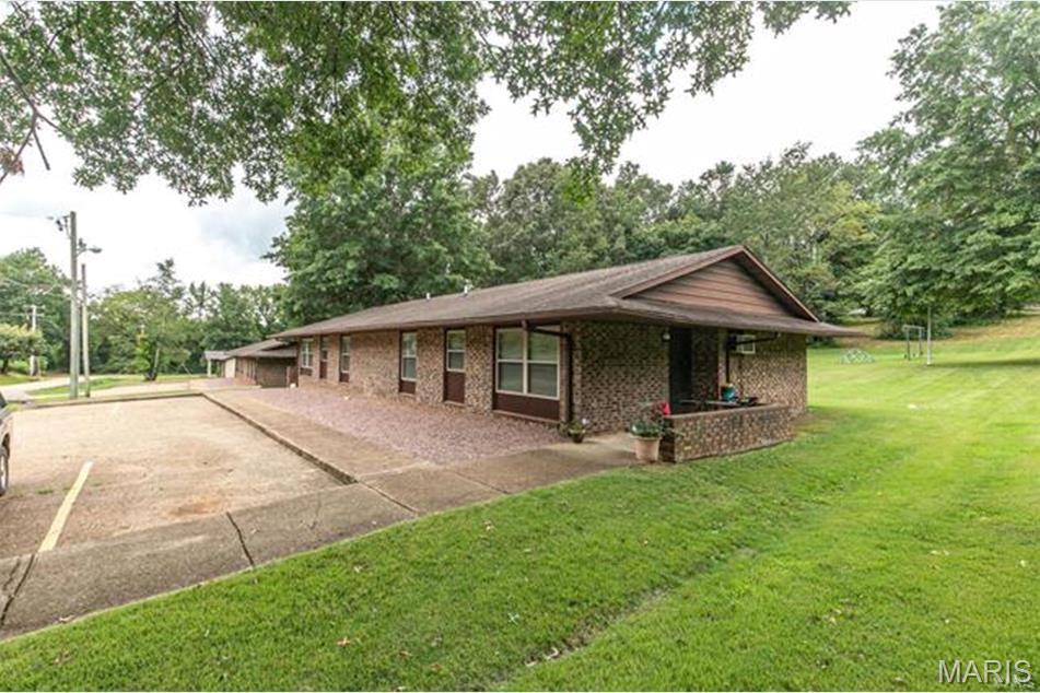 Investors take note! This 24 unit apartment complex has the potential to generate $23,276 monthly or $279,312 annually. There is a one bedroom unit being used as an onsite office. This for profit HUD complex offers nice, low maintenance exterior buildings, paved parking for tenants, all in a quiet and flourishing southeast Missouri town where units stay rented! The current manager has a waiting list so vacancies that cut into profits are minimal unless maintenance to the unit requires vacancy! With an onsite manager and management company willing to stay with the purchase, sit back and let the investment pay for itself. This complex generates enough income for the buyer to recoup their investment and still draw profit! There is a rent increase approved for October 1 of this year. The following amounts are current as of date, they will go up based on the amount approved in October.
The complex is comprised of the following:
8-1 bedrooms units that gross $829 each
12-2 bedroom units that gross $985 each
4-3 bedroom units that gross $1,206 each
CALL TODAY!