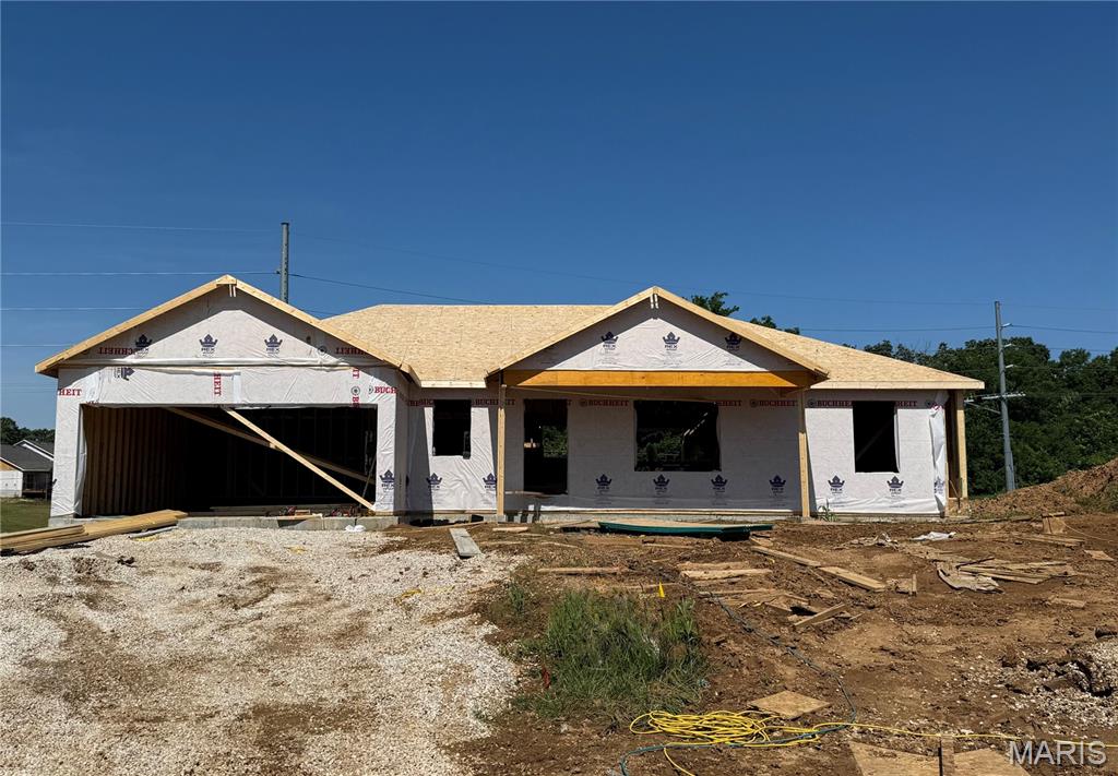 Under Construction - Cul-de-sac lot in McKendree Crossing Neighborhood - location close to Cape/Jackson/Schools/I-55.  Vaulted ceilings, with living room, kitchen and dining opening to each other giving extra space and room. The split bedroom concept gives privacy, primary bath features walk-in shower and double vanity with walk-in closet. Stylish kitchen with center island, solid surface countertops and stainless steel appliances. No carpeting on the main floor with luxury vinyl flooring all through-out. The full walk-out basement offers a pre-designed layout  for later expansion. Nothing beats the smell of BRAND NEW! Expected completion appx 90 days. Buyer still has time to pick out some finishes