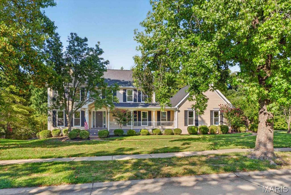 Thoughtfully renovated in sought-after Wilson Farm Estates. Set on a .72-acre lot with over 4,400 sq ft of living space, this home offers room to gather, work, play & unwind. Host family and friends around the oversized stone island while dinner comes together on the 8-burner dual-fuel range in a light-filled showpiece kitchen. Find focus in the library/office or relax by the fire. Retreat upstairs to a spacious primary suite with spa-inspired bath, freestanding tub & oversized shower. The newly reconfigured walk-out lower level adds a 5th bedroom, expansive rec space & bonus room ready for movie nights, games, hobbies or fitness. Take dinner outside on the deck overlooking the large, tree-lined backyard. With spaces to come together and room to spread out, this home is designed for everyday living, entertaining & everything in between.
