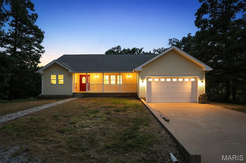 Country Setting – 3 Acres, 5 Bedrooms, Room to Roam
Enjoy the peace and privacy of a wooded 3-acre setting, just a short drive from all the conveniences of town. Mature trees and open space create a private, natural backdrop, while the walkout design brings the outdoors in and offers easy access to the grounds.
This spacious home offers 5 total bedrooms — 3 on the main level and 2 more in the partially finished walkout basement — with 2 full bathrooms upstairs and 1 full bathroom downstairs, plus a rec area downstairs that's ready for movie nights, a home gym, or extra hangout space. Whether you need room for a growing family, visiting guests, or a multi-generational setup, this layout delivers the flexibility to make it work.
A two-car attached garage adds everyday convenience, and the wooded acreage offers plenty of room to garden, play, or simply enjoy the quiet.
This home is a great opportunity for a buyer looking to add some updates and TLC — ready to become exactly what you've been searching for: a wooded retreat with space to grow, just minutes from shopping, dining, and everything town has to offer.