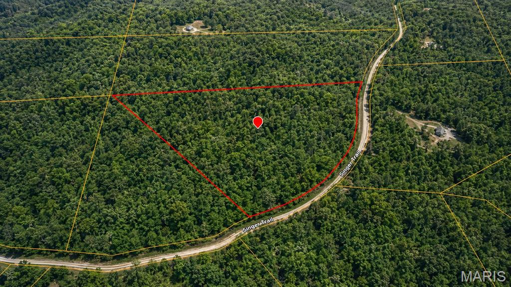 Escape to the quiet of Washington County with this 3.43± acre tract located off Singer Trail near Potosi, Missouri. Tucked away in a peaceful rural setting, this property offers an opportunity to create your own private getaway, recreational retreat, or future homesite surrounded by the natural beauty of the Missouri Ozarks.

Outdoor enthusiasts will appreciate the property's location near the Mark Twain National Forest, with the surrounding area known for hunting, hiking, trail riding, camping, and other outdoor recreation. Whether you're looking for a place to build, set up a weekend basecamp, or simply own a piece of Missouri land, this manageable-sized acreage offers plenty of possibilities.

PROPERTY HIGHLIGHTS

3.43± acres
Washington County, Missouri
Located off Singer Trail
Rural, private setting
Near Mark Twain National Forest and outdoor recreation
Potential homesite or recreational property
Convenient acreage for a weekend getaway or permanent retreat
GPS Coordinates: 38.01356, -90.93327

BUYER INFORMATION
 Property lines shown in marketing materials are approximate and for reference only.