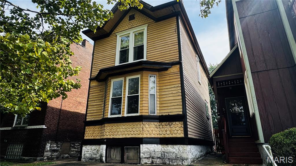 Fantastic rehab/investment opportunity in a highly desirable South City location near Tower Grove Park! Whether you're an owner-occupant ready to create your dream home or an investor searching for your next renovation project, this historic home offers tremendous potential and plenty of character. Featuring 2 bedrooms, 1 full bath, a full walkout basement, and a level, fenced backyard, the property provides a great foundation for your vision. Original features include mostly hardwood flooring, bay windows, built-in cabinetry, ceiling fans, an exposed brick chimney, and a circuit breaker panel. Previous improvements include new furnace and A/C repairs (9/12), sewer lateral repairs, roof (6/14), thermal windows (9/12), gutters (8/12), and appliances (6/14). Enjoy an outstanding location just minutes from Tower Grove Park, the vibrant Morganford Business District, neighborhood restaurants, cafés, shops, and entertainment. Bring your ideas and unlock the possibilities this South City gem has to offer! Property is being sold strictly AS-IS. Seller will make no repairs and will not provide or pay for any inspections.