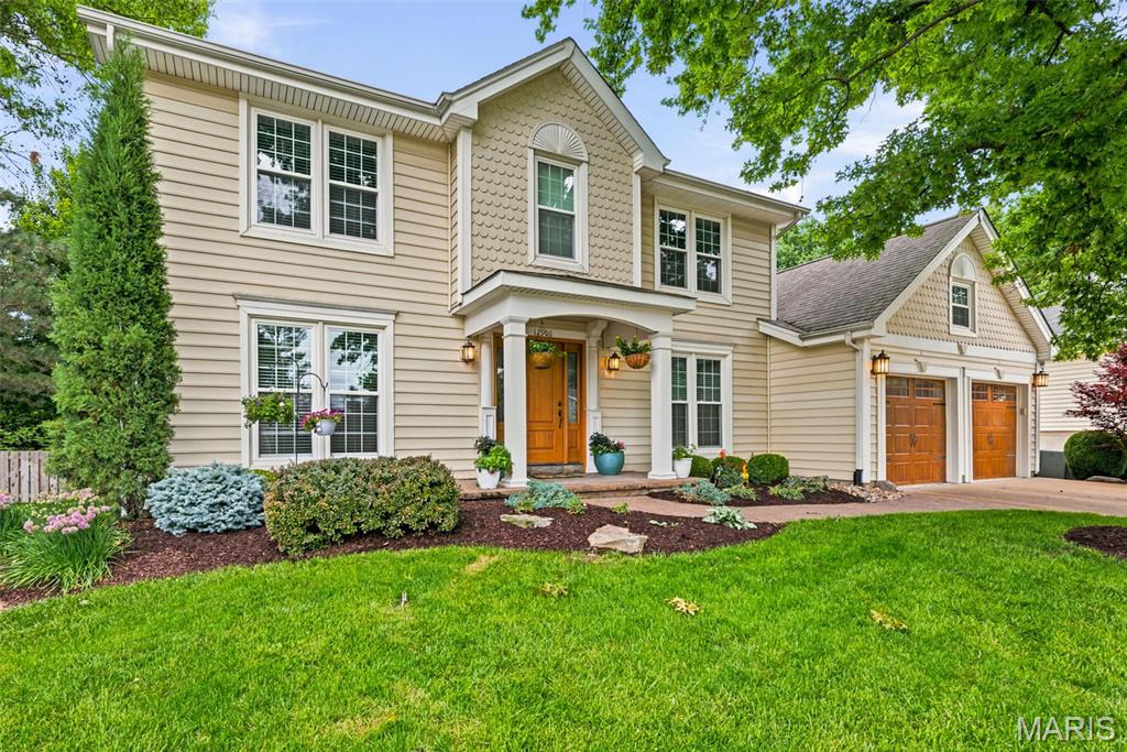 Nestled on a quiet cul-de-sac in the Regal Green section of Polo Run, this beautifully updated 4-bedroom, 3.5-bath two-story offers an exceptional blend of thoughtful updates, flexible living space, and a truly park-like setting in the Parkway School District. Mature trees, lush landscaping, and inviting curb appeal set the tone before you even step inside. The remodeled main level has been opened up for the way people live today, creating an easy flow between the kitchen, breakfast area, and family room. The kitchen is a standout with warm custom-style cabinetry, expansive stone counters, a large center island with seating, stainless appliances, gas cooktop, wall oven, built-in microwave, tile backsplash, pendant lighting, and warm neutral tile flooring. A built-in beverage/bar area with glass-front cabinetry, wine storage, display shelving, and a small sink adds both function and charm. The family room features a fireplace with built-ins and opens to a stunning sunroom addition overlooking the backyard. Walls of glass, tile flooring, and treetop views make this a favorite year-round retreat. A formal dining/breakfast space, inviting foyer, and beautiful wood flooring add to the home’s warm, updated feel. Upstairs are four bedrooms, including a spacious primary suite with walk-in closet and custom organizers. The updated hall bath features a stone-topped vanity, modern fixtures, wood-look tile flooring, and a glass-enclosed shower with bench, handheld shower, grab bar, and decorative tile detail. The finished lower level adds tremendous flexibility with a second family room/TV lounge, built-in media wall, fireplace, recreation/game area, a separate office or guest space, workout area, and full bath. Whether you need room to work, play, exercise, host, or unwind, this level delivers. Outside, the backyard is something special: level, private, and surrounded by mature trees and common-ground views. The professionally landscaped stone patio includes seating and dining areas, retaining walls, planting beds, and a peaceful backdrop that feels like your own private garden. The oversized garage includes epoxy flooring plus an added storage area ideal for bikes, lawn equipment, tools, and more while still preserving comfortable two-car parking. Polo Run residents enjoy subdivision amenities including pool and tennis, with easy access to highways, Creve Coeur Park, Westport, shopping, dining, and recreation. A beautifully updated home in a private cul-de-sac setting with space, style, and a backyard you will not want to leave.