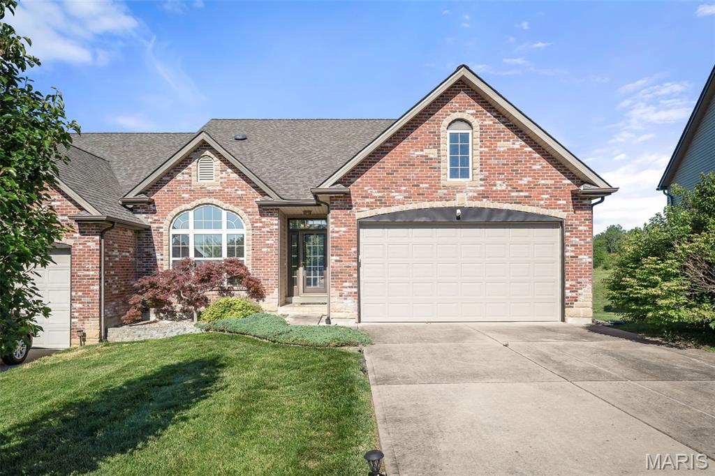 Welcome home to this stunning multi-level villa where soaring ceilings, rich wood trim, and beautiful wood doors. A dramatic wall of floor-to-ceiling windows fills the home with natural light while showcasing peaceful wooded views. The spacious open-concept design features a versatile den, generous living spaces, and three finished levels each with its own bedroom and full bath perfect for guests, multi-generational living, or flexible lifestyles. The finished walkout lower level adds even more living space with a private bedroom, full bath, and abundant storage, including a cedar closet. Enjoy countless walk-in closets throughout the home and a layout designed for both comfort and convenience. Step outside to the deck overlooking mature trees and tranquil green space. Tucked away on a quiet cul-de-sac with a private driveway, this community offers carefree living with lawn care handled for you. Experience the charm of small-town living while remaining just minutes from shopping, dining, and everyday conveniences. This is truly a home you must see to appreciate!