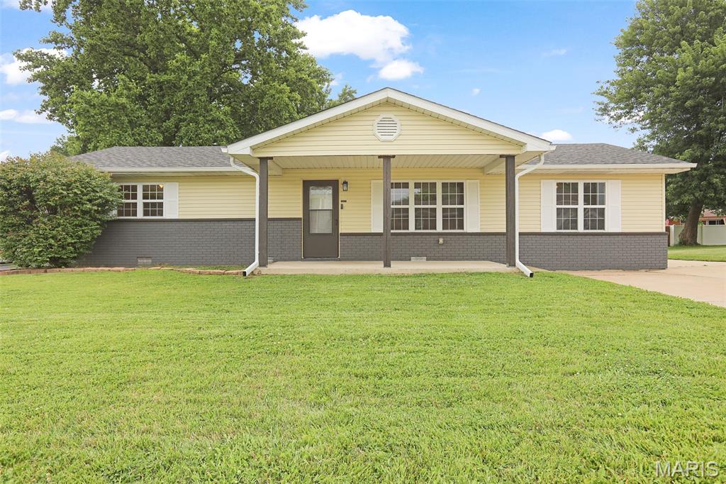 More than meets the eye! This spacious, all-one-level home offers over 1,800 square feet of comfortable living space with a layout designed for everyday living and entertaining. Featuring 3 bedrooms with a split layout and 2 full bathrooms, including a private primary en suite, there's room for everyone to spread out. The impressive 23' x 24' family room is the heart of the home, showcasing a cozy wood-burning stove and plenty of space for gatherings. Outside, you'll appreciate the oversized two-car detached garage, concrete patio, and privacy-fenced backyard perfect for pets, play, or relaxing evenings. Recent updates provide peace of mind and modern appeal, including new roof, fresh paint, updated flooring, lighting, added insulation, and HVAC. Conveniently located in the Roxana School District, this move-in-ready home combines space, updates, and value—all on one level! Don't let this one fool you from the curb—it's much larger than it appears and is ready to welcome you home.