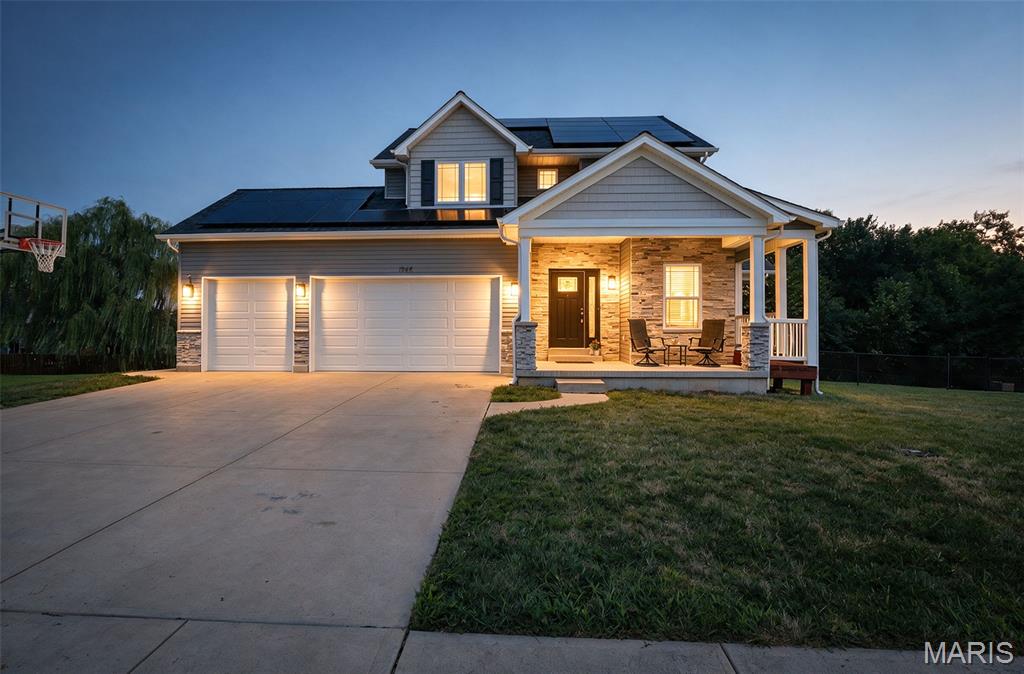 DON’T WAIT FOR RATES TO COME DOWN. THE SELLERS OF 1946 MASTERS ARE READY TO BUY YOUR RATE DOWN NOW AND YOU CAN BE MOVING INTO YOUR DREAM HOME.  COME TAKE A LOOK TODAY AND YOU COULD SALE APPROXIMATELY $500+ PER MONTH ON YOUR MORTGAGE. (terms vary by lender).   Luxury well maintained Custom 2-Story home offers 4 bedrooms, 2.5 baths with many features providing efficiency, functionality and style. Situated on a rare double lot backing to common ground, this property provides added privacy with exceptional outdoor living spaces. The family is relocating and the only reason they are willing to leave this great custom home offering over 2276 square feet of living space which includes a finished 4th bedroom in the partially finished 9-foot-pour basement. The open floor plan offers 9-foot ceilings throughout the home also. You are welcomed by the covered front porch opening to an entry way with a dedicated main-floor office that is an ideal space for working from home, studying, or creating a quiet space. The chef style kitchen will be the heart of the home featuring custom 42-inch cabinetry w/lighting over the granite countertops, stainless steel appliances, a 5-burner gas stove, double wall ovens, a built-in wine/beverage refrigerator, custom island that will provide storage/workspace and seats up to 5 and a walk-in pantry. The large dining area transitions from the kitchen to the great living room space where you can enjoy the beautiful stone gas fireplace, the half-bath provides your guests with convenience and luxury. The second level offers 3 spacious bedrooms and a full bath. The primary suite is a private oasis which offers: a luxurious ensuite bath with dual Corian vanities, a jetted soaking tub, and a walk-in Corian shower w/glass doors & a built-in bench; a linen and large walk-in closet. The laundry room is conveniently located on the second level and includes the washer and dryer. The 2nd and 3rd bedrooms are spacious and offer large closets. The lower level offers a 9-foot pour with a finished 4th bedroom with egress window. There is a full bathroom framed and roughed-in ready to complete as well as partial framing already in place, and an additional electrical panel that will stay to allow you to complete the space as you need, could be set up for in-law quarters. The dual gas HVAC units and 2 water heaters provide all the comfort you need. The solar panels help make sure the home is very efficient to live in, cutting the electric billing significantly. The outside living space features complete this home for entertaining or enjoying the rare double lot backing to common ground and mature trees. The custom wraparound deck and porch will offer many hours of privacy for entertaining. The covered portion provides a complete living space offering a ceiling fan & TV hookups, while the open deck offers BBQ & sun time. It all overlooks the fully fenced backyard and multiple raised garden beds which are equipped with drip irrigation as is the railing planters on the porch making it perfect for gardening and for anyone who enjoys spending time outdoors. A Rain Soft water softener & purification system provide quality water. There is a newer roof and don't forget the oversized 3-car garage complete with a service side door and built-in shelving, cabinet, with fans that will remain with the home. The extra-large driveway and fenced in double lot on this home creates the space you need for the entire family.