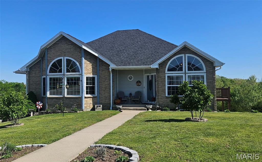Welcome to 146 Vernon, where pride of ownership shines in every detail. This beautifully maintained home offers the perfect blend of comfort, style, and thoughtful updates—truly move-in ready.

The main level features two spacious living areas, both filled with natural light from oversized windows. One offers a cozy fireplace and built-in bookcase, creating the perfect space to relax. You’ll also find an oversized dining area and a stunning kitchen complete with granite countertops, beautiful cabinetry, updated backsplash and sink, stainless steel appliances, and a sizable pantry.

Also on the main level are two generously sized bedrooms, including a private primary suite designed for comfort and relaxation. Enjoy a walk-in closet, double vanity, deep soaking tub, separate shower, and your own walk-out deck—perfect for morning coffee or unwinding in the evening.

The lower level expands your living space even further with a third living area ideal for entertaining, gaming, fitness, or hobbies. Two additional guest bedrooms, a full bath, and extra storage room provide both flexibility and functionality.

Recent updates enhance both style and peace of mind, including LVP flooring and new carpet installed in November, a new roof in 2025, and Andersen windows and a door added in September 2023. Additional improvements include a fully remodeled bathroom in July 2022 and both decks replaced in November 2021.

Homes with this level of care, space, and updates are hard to find schedule your showing today and experience everything this home has to offer.