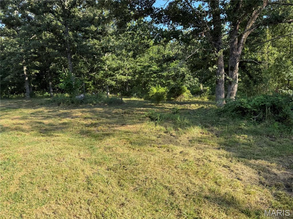 Discover the potential of this beautiful 17.9-acre property located just minutes from Steelville and popular local attractions, including the nearby rivers for floating, fishing, and outdoor recreation. Featuring a mix of mature woods and a cleared homesite, this property offers a great opportunity to build, camp, or create your own private getaway.
A well is already in place, adding to the property's value and convenience. Also located on the property is a mobile home that is not livable and will convey with the sale at no value. The property is being sold AS IS.

Whether you're looking for recreational land, a future homesite, or an investment opportunity, this acreage offers privacy, convenience, and endless possibilities in the heart of Crawford County.