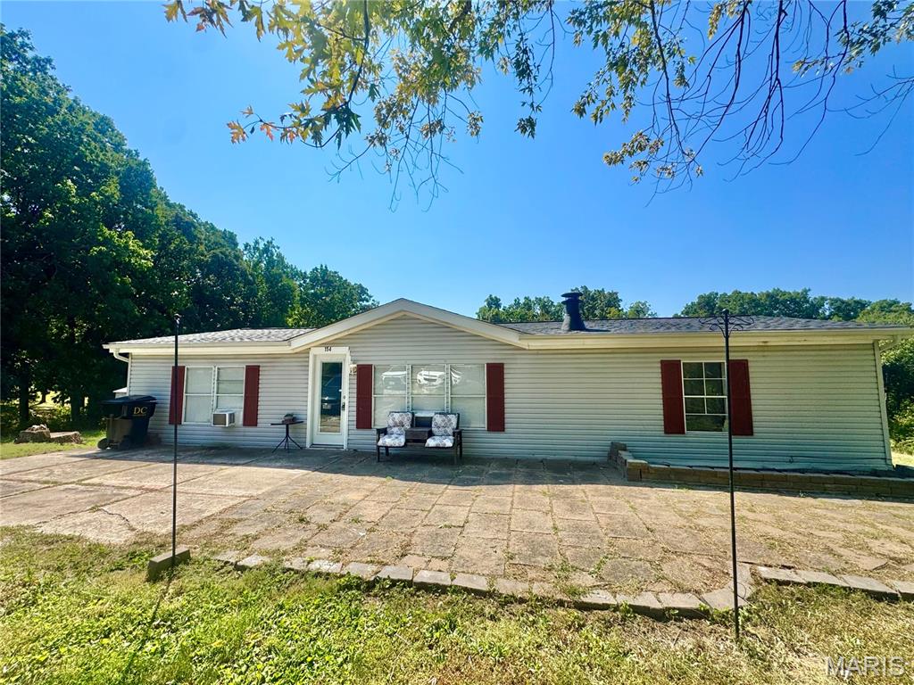 Make this 3 bed 2 bath manufactured property your place to call home! Located on over 6 acres of beautiful sprawling ground; outside offers plenty of room for whatever you may like to do. Inside holds large living room, dining room and kitchen with plenty of storage. Primary bedroom has walk in closet with private bath room. Private bath is a bit of a construction zone; bathroom is not in working order, has been gutted for a remodel that did not get completed. Toilet, vanity and corner shower panels all stay with the home to make completion a bit easier. Split floor plans offers two more bedrooms and full bath on opposite side of the home, giving desired privacy. Make your showing today to make this home yours.