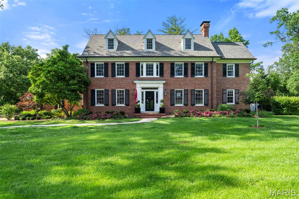 Set along one of Ladue’s coveted lanes, 5 Ridgewood Drive is a residence where timeless architecture and modern refinement converge. Thoughtfully reimagined from top to bottom, this 5-bedroom, 3.5-bath home honors its heritage while embracing a sophisticated, elevated lifestyle. Remodeled in a sophisticated styling, the home showcases refined architectural details, bespoke finishes, and beautifully proportioned spaces bathed in natural light. Every room has been intentionally designed to balance grandeur with comfort, creating an atmosphere that feels both elevated and inviting.
At the heart of the home, a stunning chef's kitchen anchors the living spaces, offering a seamless setting for intimate gatherings and large-scale entertaining alike. Luxuriously appointed baths, generously sized bedrooms, and a serene primary retreat reflect the home's commitment to quality and craftsmanship.
The thoughtfully designed main level features a grand-scale dining room, a beautifully appointed living room, a bespoke office, and a warm, inviting family room. The private owner’s suite features a beautifully updated bathroom and a dedicated 2nd laundry area. The third floor boasts an entertaining space, spacious bedroom, and full bath making this a great retreat for guests or family. 
Set on a picturesque, park-like setting amid mature trees and manicured grounds, the property embodies the enduring character that defines Old Ladue's most admired homes. The gorgeous pool and expansive lawn make this the perfect space for entertaining and relaxing. Located moments from the region's finest schools, country clubs, boutiques, and restaurants, 5 Ridgewood Drive presents a rare opportunity to own a meticulously renovated residence in one of St. Louis' most residence in one of St. Louis' most prestigious and sought-after neighborhoods.