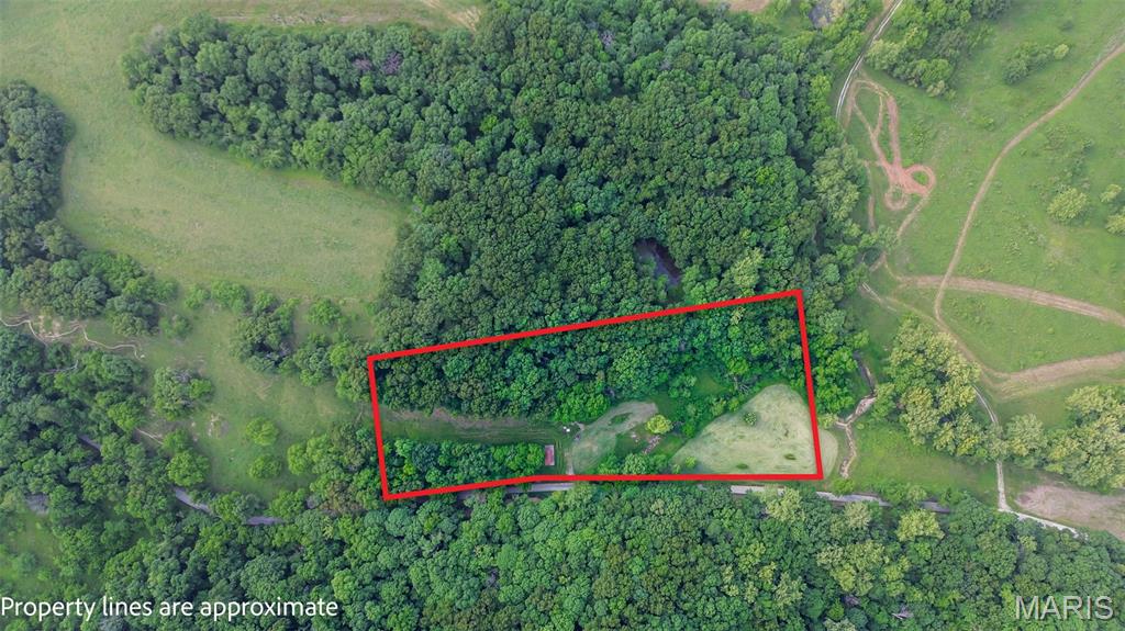 Looking for the perfect country getaway or future homesite?  This beautiful 6 acre property in northern Calhoun County, just north of Kampsville, offers a rare opportunity to enjoy the peace and privacy of rural living.  The property is already equipped with a concrete pad, metal outbuilding, electricity, a new septic system, and Calhoun County Rural Water, making it ready for your recreational use or future building plans.  Nestled alongside a creek, this scenic setting provides the ideal location for a weekend retreat, camping spot, or the home you've always envisioned.  Enjoy the quiet countryside, abundant wildlife, and all the natural beauty Calhoun County has to offer while having the convenience of utilities already in place.  Whether you're looking for a place to escape the hustle and bustle or a ready to build property, this one is worth a look!