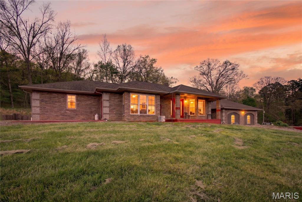 Spacious 2,729 sq ft brick home set on 20 beautiful acres of rolling fields and mature woods, complete with established ATV trails ready for riding and exploring. Located just 10 minutes from Fredericktown, this property offers a great balance of peaceful country living with easy access to town.
The home features a solid structure, generous layout, and plenty of room to spread out, making it a great opportunity for someone ready to add their own updates and personal touch. Large living areas and multiple bedrooms provide flexibility for a full-time residence, weekend retreat, or even a hunting getaway.
Step outside and enjoy everything the land has to offer—whether it’s riding trails, watching wildlife, or simply taking in the privacy and open space. With a mix of usable ground and wooded acreage, this property offers both recreation and potential.
If you’ve been looking for space, privacy, and the chance to make a home truly your own, this one is worth a look.