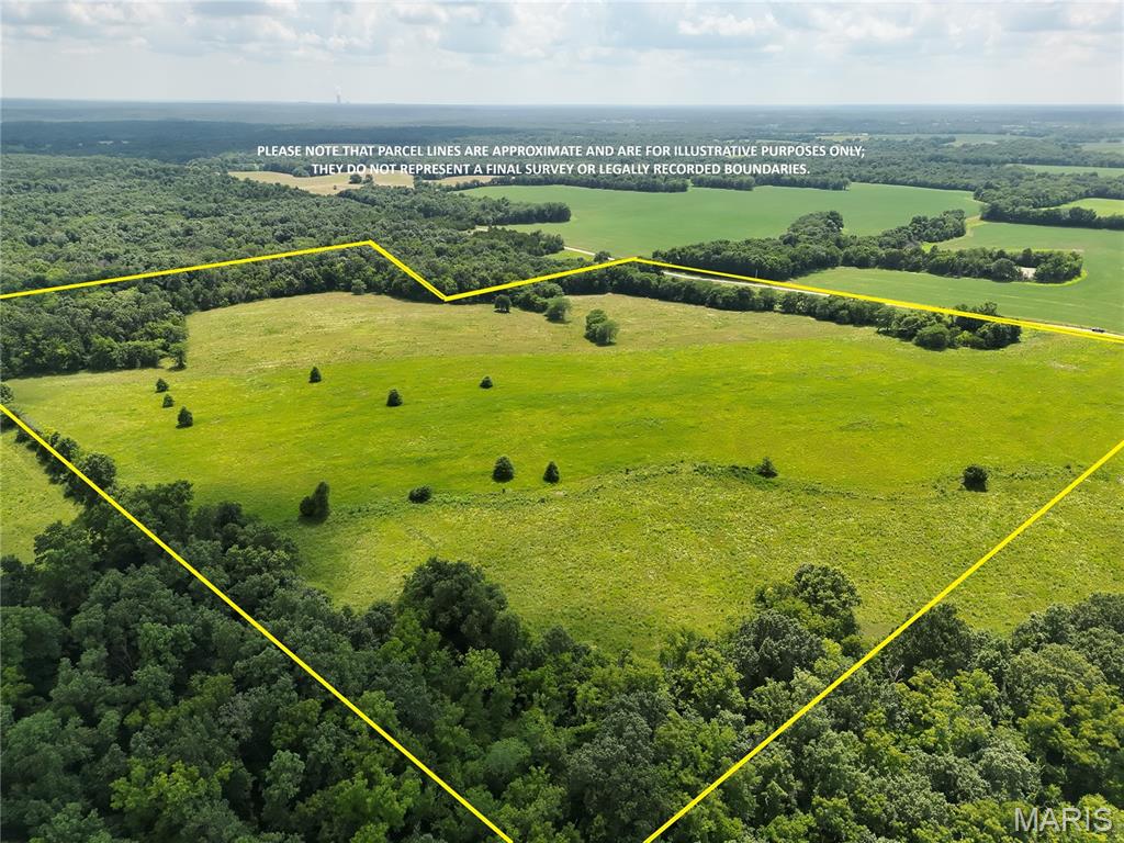 Here is Your Opportunity to Own 52.5+/- acres of productive and picturesque land in Callaway County. This gently rolling tract features an appealing balance of approximately 80% open pasture and 20% mature timber, offering both agricultural productivity and outstanding recreational appeal. The property is currently utilized as pasture but is also well suited for row-crop production if desired. A scenic wet weather creek meanders through the edge of the property, and there is an excellent pond/lake site that will enhance both the beauty and future potential of the land. Abundant deer and turkey make this an excellent hunting and outdoor recreation property. Whether you're looking to build a private estate, country retreat, establish a hobby farm, or invest in a versatile acreage, this tract offers several attractive building sites with electricity available nearby. Conveniently located just four minutes from Cranes Country Store, this property combines rural privacy with easy access to local amenities.