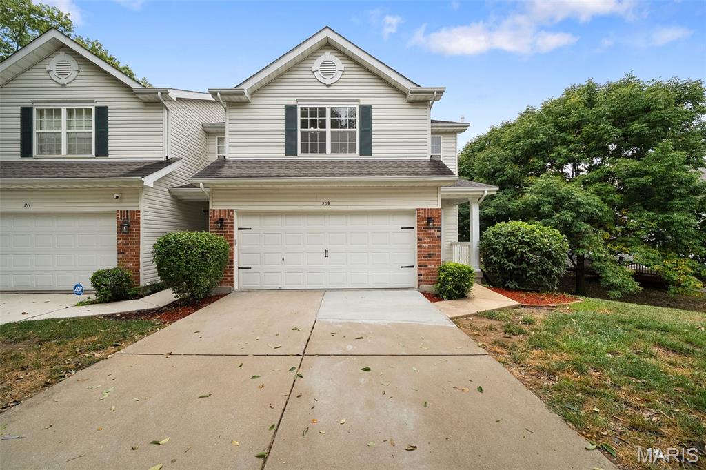 Welcome home to this beautifully maintained St. Peters townhome, tucked away on a quiet tree-lined cul-de-sac with easy access to Hwy 364, shopping, parks, and top-rated Francis Howell schools. The main level offers an inviting open floorplan with luxury vinyl flooring throughout, a spacious living area, and a well-appointed kitchen featuring freshly painted cabinets, ample counter space, updated stainless steel appliances, and a dining area just off the kitchen. The private patio is a great spot to unwind or entertain, complete with a privacy fence and fire pit. Upstairs, you'll appreciate the convenience of second-floor laundry, along with a cozy office nook that’s perfect for working from home or studying. The spacious primary suite offers a relaxing retreat with a large bath featuring a new custom vanity, separate tub and shower, and plenty of closet space. Two additional bedrooms are generously sized with great natural light and share a spacious hall bath. The finished lower level adds valuable living space with a large recreation room and plenty of additional storage. A two-car garage provides even more convenience. Fresh paint throughout, newer lighting, and a recently serviced HVAC system add to the move-in-ready appeal. Enjoy low-maintenance living in a quiet HOA community, with landscaping, snow removal, and exterior maintenance all taken care of for you with a low monthly fee!