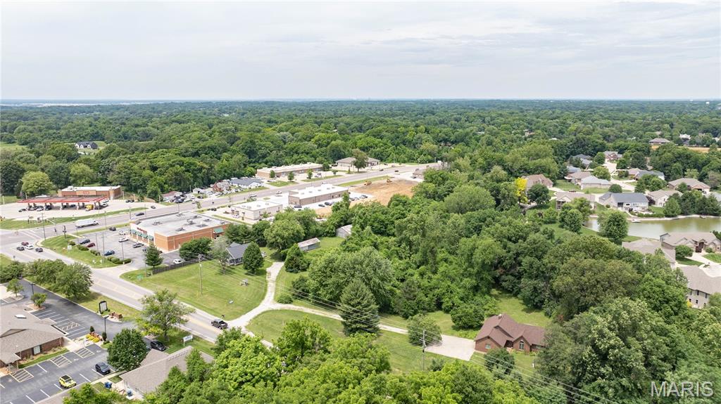 Do not miss this exceptional commercial opportunity located close to the highly visible corner of State Route 159 and State Route 162 in Maryville. This premier intersection offers outstanding exposure, strong traffic counts, and convenient access, making it an ideal site for your next development.

The offering includes four parcels totaling approximately 4.86 acres (per Madison County records), providing ample space and flexibility for a wide range of commercial uses. Whether you’re planning retail, office, or service, this property delivers the visibility and accessibility today’s businesses demand.

It’s all about location, location, location!!!  Positioned in a growing area with established surrounding development.  Located less than 1/4 mile from Anderson Hospital and various other medical buildings and providers.  The property is just a few minutes from the highly traveled Interstate 55 and Interstate 270. This is a rare opportunity to secure a sizeable commercial footprint at one of Maryville’s key intersections.

Build. Develop. Invest.
Make this prime commercial location yours.