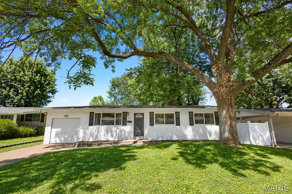 Welcome home to this beautifully updated gem in the heart of St. Charles, where charm, style, and convenience come together perfectly. From the moment you walk in, you’ll fall in love with the warm hardwood floors, abundant natural light, and inviting open feel throughout the home. The spacious living room is filled with sunlight from the oversized picture window. The separate dining room flows seamlessly into the stunning updated kitchen featuring shaker cabinetry, granite countertops, subway tile backsplash, and stainless steel appliances. Retreat to the spacious primary suite complete with its own private half bath, while two additional bedrooms and an updated full bath complete the space. French doors off the dining room lead directly to the large backyard and covered patio, the perfect setup for entertaining! The unfinished basement is ready for your finishing touch. An attached 1-car garage adds everyday convenience. New Roof (2022). All of this just minutes from Historic Main Street, local parks, shopping, restaurants, and everything St. Charles has to offer. Move-in ready with the perfect blend of updates, character, and location!