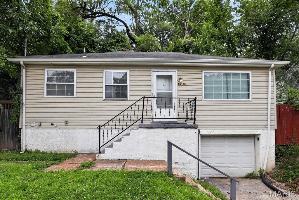 Discover the inviting charm of 10183 Cloverdale DR, STLS MO 63136, a single-family residence built in 1951. This ranch-style home offers a comfortable and convenient living experience from the moment you arrive. The residence provides two thoughtfully arranged bedrooms, offering comfortable spaces for rest and rejuvenation. A well-appointed bathroom serves the home's needs with practical design. Further enhancing this property's appeal are its functional basement and a built-in garage, providing valuable storage and utility space. We invite you to experience the comfortable lifestyle this property offers firsthand.