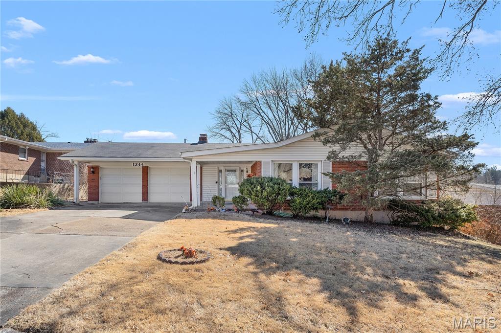 Welcome home to this amazing all-brick 4 bedroom, 2.5 bath ranch in the highly desirable Hudson Hills neighborhood of Ferguson! Priced to sell, this move-in ready home offers over 2,300 sq ft of total living space and has been meticulously cared for. Step inside to discover a spacious open floor plan featuring beautiful hardwood floors, a stunning wood-burning hearth fireplace, and an updated kitchen perfect for everyday living and entertaining. The main level includes a large family room, a living room/dining room combination, and four generously sized bedrooms, including a primary bedroom suite with private bath, plus an additional full hall bathroom. The finished lower level adds even more living space with a large recreation area, built-in bar, half bath, laundry area, and two spacious storage rooms! Additional features include a newer HVAC system and a large .28-acre lot. The backyard patio is ideal for summer cookouts, relaxing evenings, and outdoor entertaining. Conveniently located just minutes from Florissant Valley Community College, January-Wabash Park, I-270, shopping, restaurants, and more. Don’t miss this incredible opportunity—schedule your showing today!