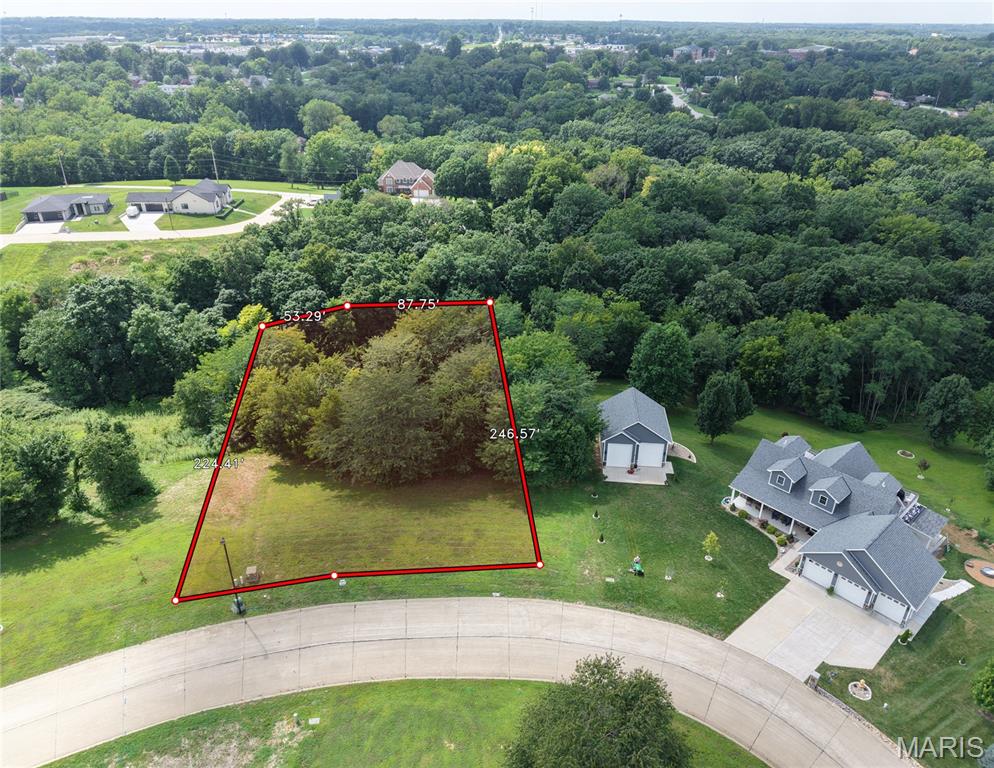 Great Walk-out Lot available for your next home, with privacy in the backyard.  Public water, sewer and natural gas on site. 25' set backs off front line and 5' off each sideline, plans must be approved by Architectural Review Board. $100 HOA fee paid yearly, minimum sq ft is 1700.