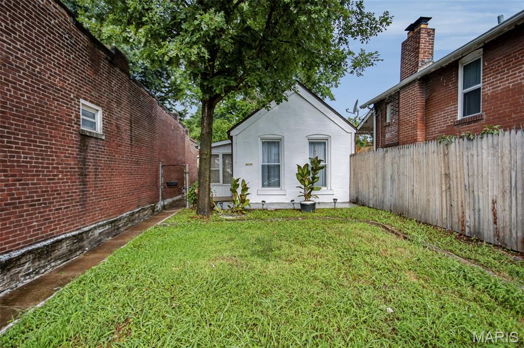 Welcome to this charming 3-bedroom, 1-bath brick ranch in the heart of Tower Grove East! Offering over 1,200 sq. ft. of convenient main-level living, this move-in-ready home has been thoughtfully refreshed with fresh interior paint, new appliances, a new incoming water line, and electrical updates. The functional floor plan features a spacious living room, separate dining room, custom cabinetry, and three comfortable bedrooms. An enclosed porch/mudroom provides additional usable space, while the private, level yard offers gated off-street parking in the rear along with plenty of space to relax or entertain. Located just minutes from Tower Grove Park and the popular Fox Park district, with easy access to local restaurants, cafés, farmers markets, neighborhood events, and all that St. Louis City has to offer.