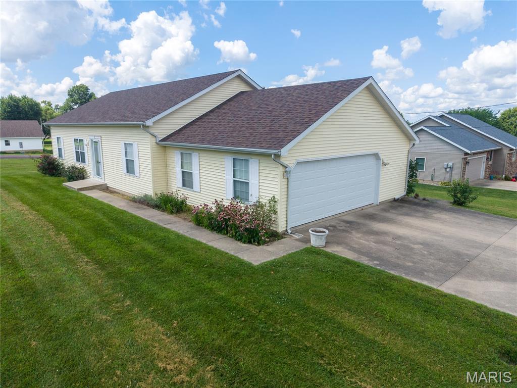 This ranch-style home is located in a well-established neighborhood and offers a spacious layout with an abundance of storage throughout. The open floor plan creates a welcoming feel, while the large kitchen features plenty of cabinets, generous counter space, and all appliances that will remain with the home including a Speed Queen washer.

The large 36" doors and ramp in the garage are a great added feature. 

The primary bedroom includes its own private bath with convenient access to the laundry/utility room. The oversized two-car attached garage offers built-in storage, providing even more space for organization.

Major updates include a roof and siding that are less than two years old and a water heater that is only 8 months old, giving you peace of mind on some of the home's biggest expenses.

With just a few cosmetic updates, this home has the potential to become the home of your dreams.  Don't miss this incredible opportunity!