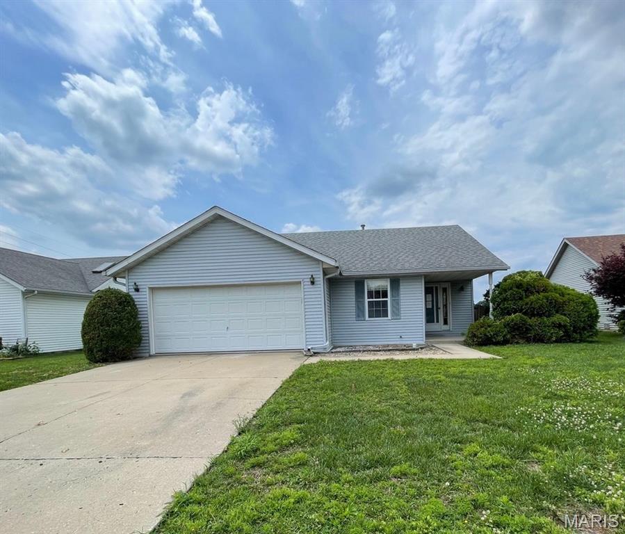 Welcome to 646 Rain Hollow in O’Fallon, IL! This inviting 3-bedroom, 2-bath home offers a comfortable layout with plenty of space for everyday living. The front entry opens into the living room, which flows into the kitchen and dining area for a convenient open-concept feel. Three bedrooms and two full bathrooms provide flexible space for a variety of needs. A full basement offers valuable additional space for storage, hobbies, recreation, or future finishing possibilities. The rear glass-enclosed porch extends the living space and provides a versatile area to enjoy the backyard, with an adjoining deck offering additional outdoor space. A 2-car attached garage adds everyday convenience and storage. Located in O’Fallon, this home offers access to a wide range of community amenities, including O’Fallon Community Park, O’Fallon Family Sports Park, walking and recreational trails, playgrounds, sports facilities, and the O’Fallon Aquatic Center.  This property may qualify for Seller Financing (Vendee). If Property was built prior to 1978, Lead Based Paint Potentially Exists Buyer and/or buyer agent to verify all MLS data.  Property details, dimensions, permitted uses, and all information should be independently verified by the buyer and buyer's agent.