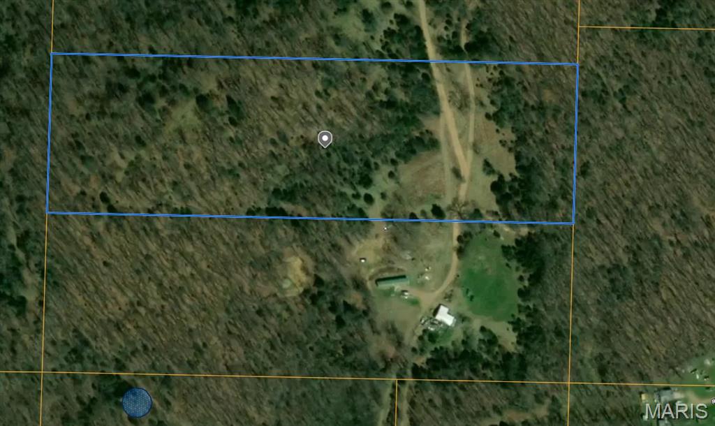 FOR SALE: 12 Secluded Acres - Wooded Hillside Retreat in Rogersville School District Escape to the quiet of the woods with this beautiful 12-acre parcel tucked into a secluded hillside setting. Located in the desirable Logan-Rogersville School District, the perfect place for off-grid getaway. Great potential for a custom home, hunting cabin, or investment. Just minutes from Rogersville, with convenient access to Springfield Perfect for those seeking space, freedom, and peace of mind.