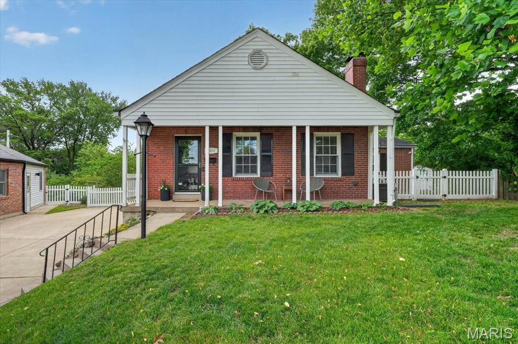 Don’t miss your chance to own this charming full brick 3 bed, 2.5 bath home tucked away on a quiet cul-de-sac in the heart of Brentwood! This home offers a warm and inviting blend of original character with desirable modern updates, from the original arched doorways and hardwood floors, to the updated appliances and multiple entertaining areas. The full-brick addition creates a spacious primary suite complete with a full bath and walk-in closet, while the finished lower level offers the perfect hangout space with a TV/lounge area, bar with wine fridge, and plenty of extra space for games, toys, or a home office. Plenty of options for hosting parties, including in the large dining room, out on the side deck and courtyard, or underneath the pergola on the large aggregate back patio overlooking the sprawling backyard and rear garden. Plenty of off-street parking in the attached garage and double wide driveway, and ample storage space in the unfinished basement area and backyard shed. And the neighborhood lifestyle is hard to beat — follow the path just beyond the backyard to nearby parks, playgrounds, and the nationally ranked Brentwood schools, including Mark Twain Elementary less than 1/4 mile away. All this and more surrounded by great neighbors on a cul-de-sac in centrally located Brentwood.