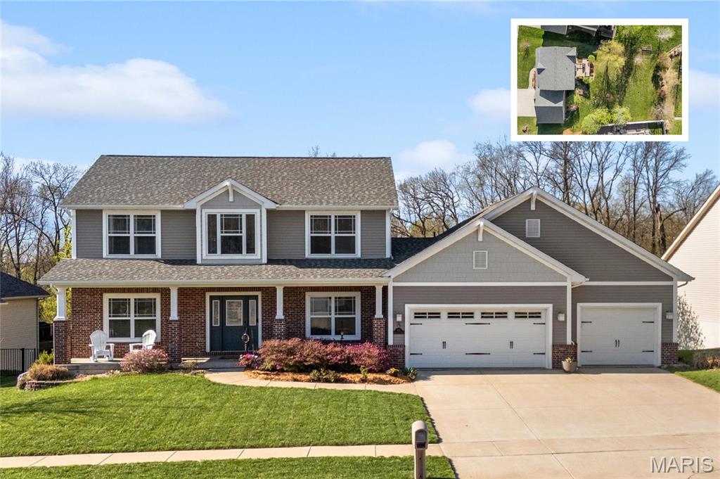Private 1/2-Acre Wooded Retreat in Huntington Chase Neighborhood located in O'Fallon, Illinois. Experience unparalleled privacy situated on a premium, tree-lined 1/2-acre walkout lot, this exceptionally maintained home backs directly to pristine wooded green space, meaning zero backyard neighbors. Welcome guests from the inviting full-length front porch into a bright, open floor plan bathed in natural light.  The heart of the home is an open-concept kitchen designed for both function and style, featuring tall soft shut cabinetry with crown molding, a pantry, and a sprawling center island with ample prep space. The breakfast area flows seamlessly with access to the rear deck with stairs leading down to your secluded backyard. Entertain effortlessly in the adjoining/ open family room, complete with a cozy fireplace and built-in media speakers, or utilize the flexible front living room as a dedicated home office. Gorgeous, meticulously cared-for real hardwood floors extend through the main level, which also boasts a formal dining room and a massive 34x25 oversized three-car garage.  Second level: four well sized bedrooms, including a spacious primary suite accented by a tray ceiling. The primary ensuite bath offers adult-height double vanity, separate soaking tub and shower, large linen closet, and an expansive walk-in closet. Three additional guest bedrooms ample closet space and are conveniently located to the full hall bath. A convenient second-floor laundry room and hall linen complete the second level.  The deep 9-foot pour, walkout lower level offers endless potential. Already featuring a professionally sprayed exposed ceiling (in the "main" area) for an inviting, semi-finished feel, it’s perfectly primed for a future 5th bedroom, bathroom, and family room. Recent seller updates provide total peace of mind: a newer roof, siding, gutters, and water heater, plus radon mitigation and security systems. One owner home, pet free since construction. Located just minutes from I-64, parks, shopping, and Scott Air Force Base, this quality-built home secures top-tier O'Fallon K-12 education (District 90 and OTHS).